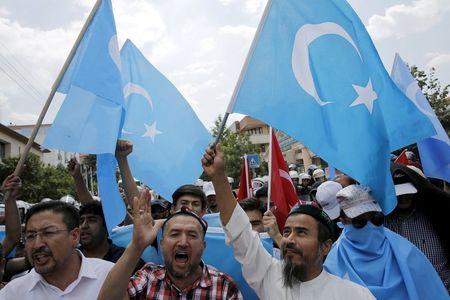Demonstrators shout slogans as they attend a protest in front of the Thai Embassy in Ankara, Turkey, July 9, 2015. PHOTO BY REUTERS/Umit Bektas
