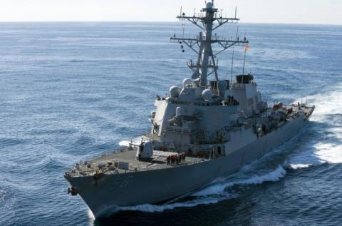 The guided-missile destroyer USS John S. McCain approaches the aircraft carrier USS George Washington for a fueling at sea in this December 5, 2010 handout photo courtesy of the U.S. Navy. PHOTO BY REUTERS/U.S. Navy/Mass Communication Specialist Seaman Cheng S. Yang