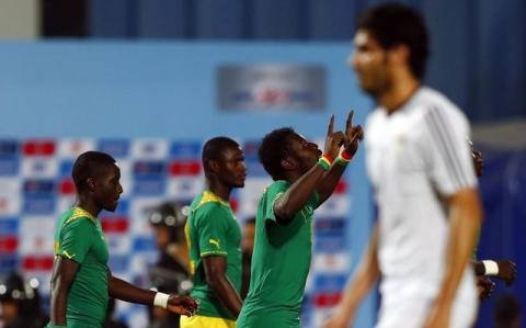 Senegal's Mame Diouf (2nd R) celebrates after scoring a goal against Egypt during their African Nations Cup qualifying soccer match in Cairo, November 15, 2014. PHOTO BY REUTERS/Amr Abdallah Dalsh
