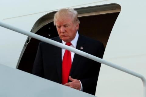 U.S. President Donald Trump arrives at Joint Base Andrews, Maryland, U.S., upon his return to Washington after a weekend at the Trump National Golf Club in Bedminster, New Jersey, July 3, 2017. PHOTO BY REUTERS/Yuri Gripas