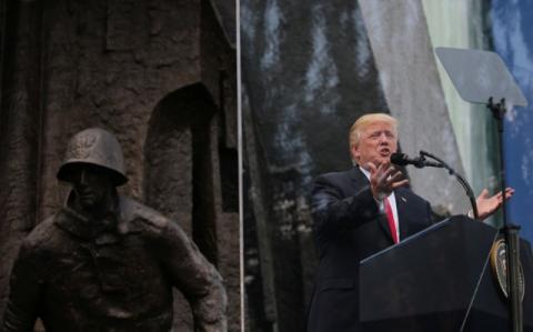 U.S. President Donald Trump gives a public speech in front of the Warsaw Uprising Monument at Krasinski Square in Warsaw, Poland, July 6, 2017. PHOTO BY REUTERS/Carlos Barria