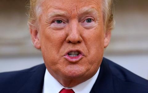 U.S. President Donald Trump speaks after John Kelly was sworn in as White House Chief of Staff in the Oval Office of the White House in Washington, U.S., July 31, 2017. PHOTO BY REUTERS/Joshua Roberts