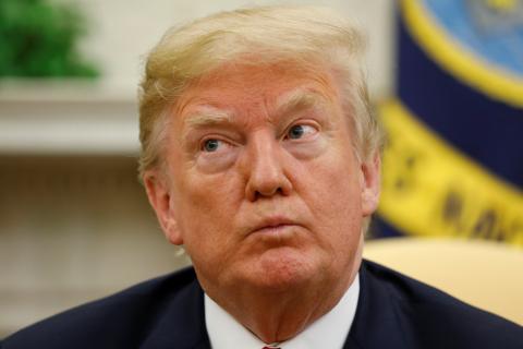 U.S. President Donald Trump listens to a question while meeting with Japanese Prime Minister Shinzo Abe in the Oval Office of the White House in Washington, U.S., June 7, 2018. PHOTO BY REUTERS/Kevin Lamarque