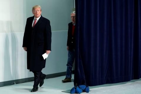 U.S. President Donald Trump arrives with Senate Majority Leader Mitch McConnell (R-KY) to speak to the media following the Congressional Republican Leadership retreat at Camp David, Maryland, U.S., January 6, 2018. PHOTO BY REUTERS/Yuri Gripas