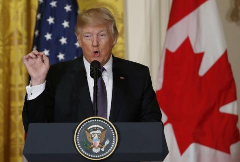 U.S. President Donald Trump addresses a joint news conference with Canadian Prime Minister Justin Trudeau at the White House in Washington, U.S., February 13, 2017. PHOTO BY REUTERS/Kevin Lamarque