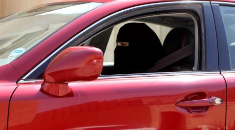 A woman drives a car in Riyadh, Saudi Arabia on October 22, 2013. PHOTO BY REUTERS/Faisal Al Nasser