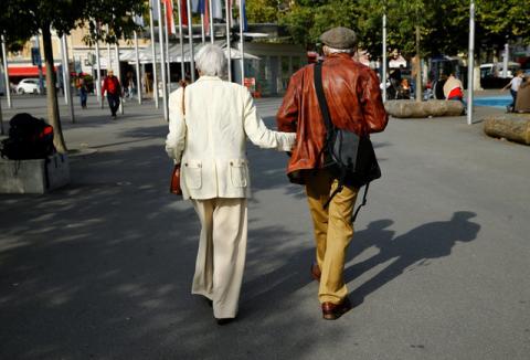 Elderly people walk in the street, ahead of a national vote on pensions reform, in Lausanne, Switzerland, September 22, 2017. PHOTO BY REUTERS/Denis Balibouse