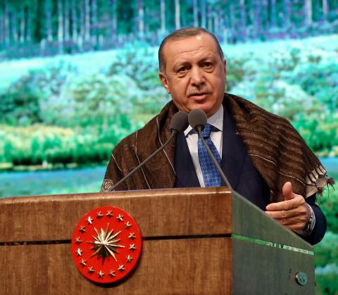 Turkish President Tayyip Erdogan makes a speech during a meeting in Ankara Turkey, March 21, 2018. PHOTO BY REUTERS/Kayhan Ozer/Presidential Palace