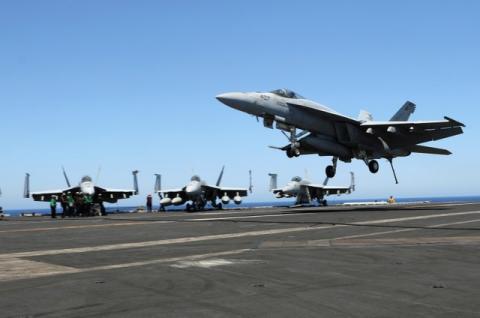 F/A-18 fighter jet takes off at the USS Harry S. Truman aircraft carrier in the eastern Mediterranean Sea. PHOTO BY REUTERS/Andrea Shalal