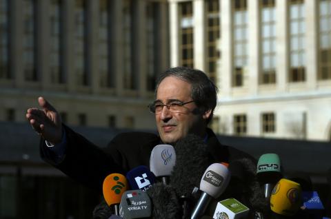 Syrian Deputy Foreign Minister Faisal Meqdad addresses the media after a meeting at the Geneva Conference on Syria at the United Nations European headquarters in Geneva