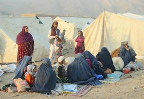 An Afghan family waits for help from the government and aid organizations in Takhar, Afghanistan October 11, 2016, after fleeing their homes in neighboring Kunduz, which has been the scene of fighting between Taliban militants and government troops. PHOTO BY REUTERS/Nasir Wakif