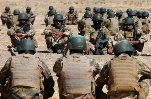 Fighters from predominantly Sunni Arab force take part in a training session before the upcoming battle to recapture Mosul in Bashiqa, October 6, 2016. PHOTO BY REUTERS/Thaier Al-Sudani