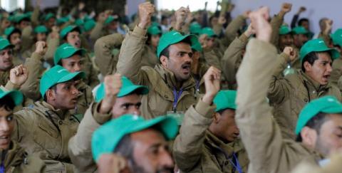 Pro-Houthi fighters, who have been injured during recent fighting, shout slogans during a rally held to honour those injured or maimed while fighting in Houthi ranks in Sanaa, Yemen, January 29, 2017. PHOTO BY REUTERS/Mohamed al-Sayaghi