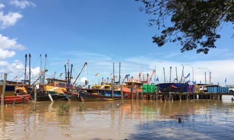 Malaysian fishing boats moored at the Bintulu fishing jetty to land their catch, May 5, 2016. PHOTO BY REUTERS/Joseph Sipalan