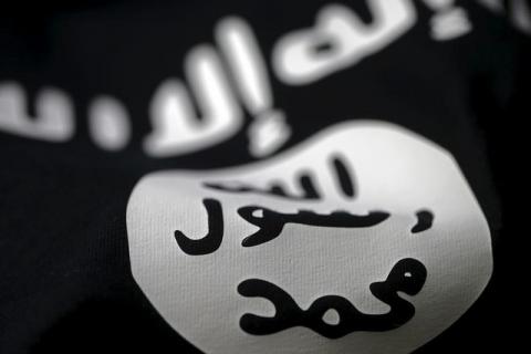 An Islamic State flag is seen in this picture illustration, February 18, 2016. PHOTO BY REUTERS/Dado Ruvic