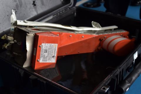 The flight data recorder of AirAsia QZ8501 is seen in a carrying case onboard Indonesian navy vessel KRI Banda Aceh, in the Java Sea, January 12, 2015. PHOTO BY REUTERS/Adek Berry