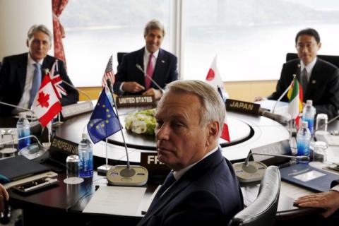 France's Foreign Minister Jean-Marc Ayrault (foreground) sits with Britain's Foreign Minister Philip Hammond (back, L-R), U.S. Secretary of State John Kerry and Japan's Foreign Minister Fumio Kishida for the start of the first working session of the G7 foreign minister meetings in Hiroshima, Japan April 10, 2016. PHOTO BY REUTERS/Jonathan Ernst