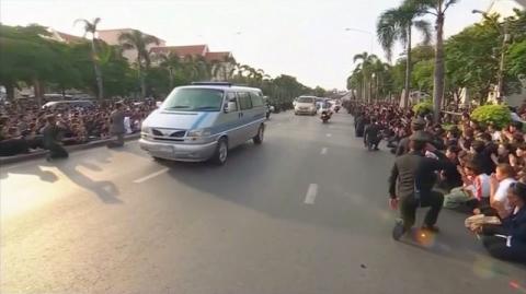 A procession carrying the hearse of Thailand's late King Bhumbiol Adulyadej makes its way from the hospital to the Grand Palace in Bangkok, in this still image taken from video October 14, 2016. PHOTO BY Reuters TV