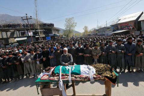 People offer funeral prayers for Umar Farooq, a civilian who was killed on Sunday during a protest against by-polls, in Barsoo village in Ganderbal district in Kashmir, April 10, 2017. PHOTO BY REUTERS/Danish Ismail