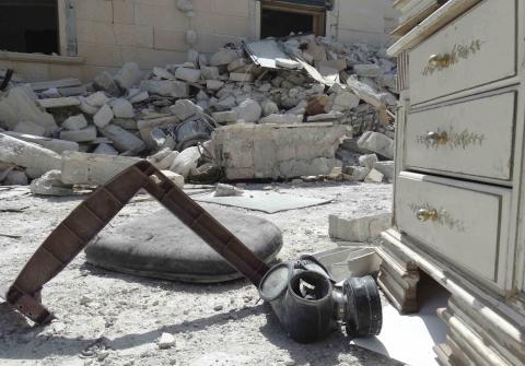 A gas mask is seen at a damaged base of the al Qaeda-linked Nusra Front, that was targeted by what activists said were U.S.-led air strikes in Reef al-Mohandeseen al-Thani in Aleppo