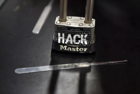 A padlock is displayed at the Alert Logic booth during the 2016 Black Hat cyber-security conference in Las Vegas, Nevada, U.S. August 3, 2016. REUTERS/David Becker