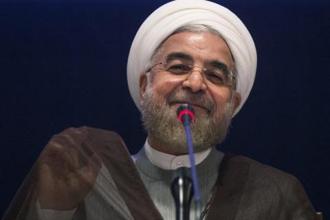 Iran's President Hassan Rouhani smiles while replying to a question during a news conference on the sidelines of the 69th United Nations General Assembly at United Nations Headquarters in New York, September 26, 2014. PHOTO BY REUTERS/Adrees Latif