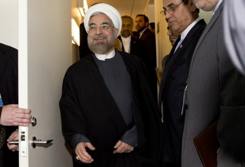 Iran's President Hassan Rouhani arrives for a meeting with his French counterpart Francois Hollande (not pictured) on the sidelines of the U.N. General Assembly in New York