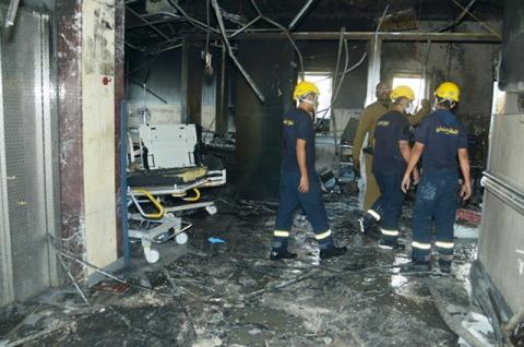 Members of Saudi Civil Defence inspect the damage at Jazan General Hospital following a pre-dawn fire in the port city of Jazan, Saudi Arabia, December 24, 2015. PHOTO BY REUTERS/Saudi Civil Defense