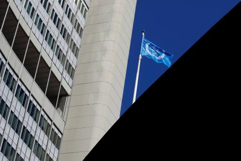 The flag of the International Atomic Energy Agency (IAEA) flies in front of its headquarters during the General Conference in Vienna, Austria, September 18, 2017. PHOTO BY REUTERS/Leonhard Foeger