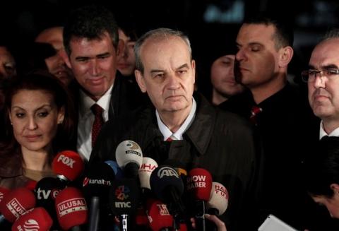Former army chief Ilker Basbug (C) speaks to media after being released from prison outside Silivri prison complex near Istanbul, March 7, 2014. PHOTO BY REUTERS/Osman Orsal