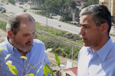 Head of Kosovo Serb delegation Oliver Ivanovic (R) speaks with Veton Surroi, member of the Kosovo Albanians delegation and leader of 'ORA' movement in Kosovo in Durres, Albania, some 40 km (25 miles) from Tirana, March 27, 2006. PHOTO BY REUTERS/Arben Celi