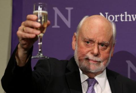 J. Fraser Stoddart, one of the winners of 2016 Nobel Prize for Chemistry, raises his glass for a toast at Northwestern University in the Chicago suburb of Evanston, Illinois, U.S., October 5, 2016. PHOTO BY REUTERS/Jim Young