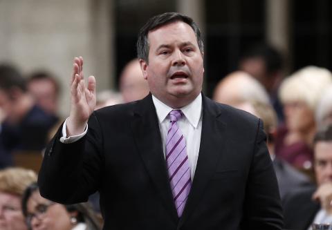 Canada's Defense Minister Jason Kenney speaks during Question Period in the House of Commons on Parliament Hill in Ottawa, February 4, 2015. PHOTO BY REUTERS/Chris Wattie