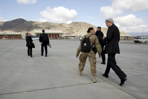 U.S. Secretary of State John Kerry (R) walks upon arrival at Kabul International Airport for a day of meetings with Afghan leaders in Kabul, April 9, 2016. PHOTO BY REUTERS/Jonathan Ernst