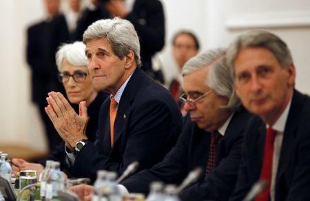 U.S. Secretary of State John Kerry meets with foreign ministers of Germany, France, China, Britain, Russia and the European Union during the Iran Talks meetings at a hotel in Vienna, Austria July 7, 2015. PHOTO BY REUTERS/Carlos Barria