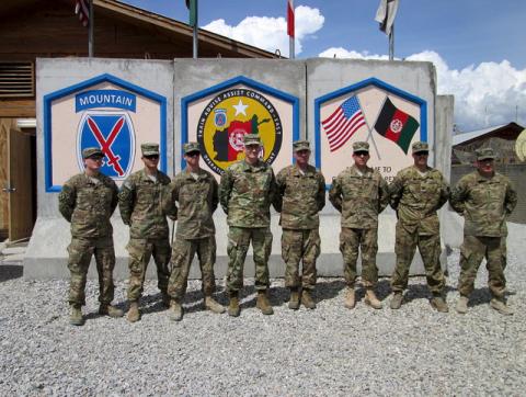 U.S. commander General for Afghanistan, John Nicholson (4th L) poses for pictures at forward operating base Gamberi, Laghman province, April 4, 2016. PHOTO BY REUTERS/Paul Tait