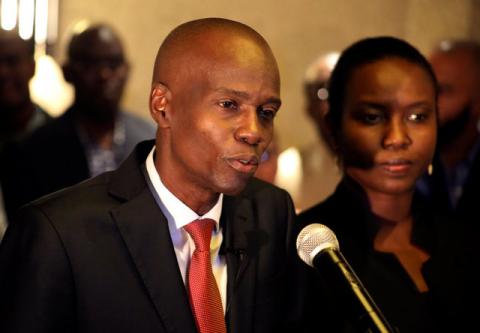 Jovenel Moise addresses the media next to his wife Martine after winning 55.67 percent of the vote in the November 20 presidential election, according to the electoral council, in Port-au-Prince, Haiti, November 28, 2016. PHOTO BY REUTERS/Jeanty Junior Augustin