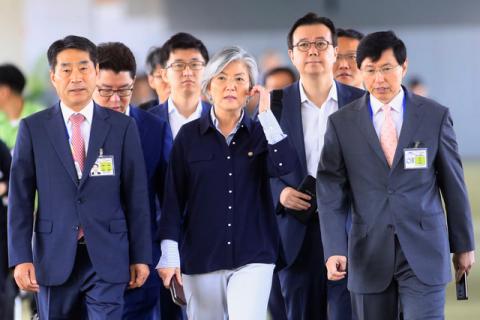 South Korean Foreign Minister Kang Kyung Hwa (C) is escorted by South Korean officials upon arrival at the international airport in Pasay city, metro Manila, Philippines August 5, 2017, to attend the 50th ASEAN Foreign Ministers meeting. PHOTO BY REUTERS/Romeo Ranoco