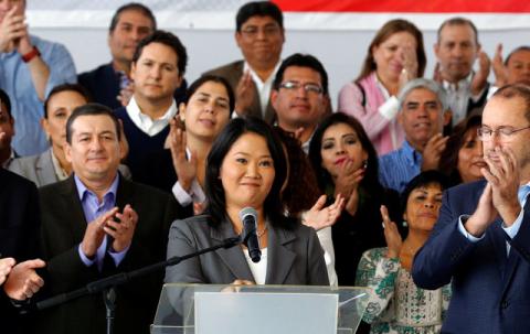Peruvian presidential candidate Keiko Fujimori accompanied by elected congressmen gives a speech to the media after Peru's electoral office ONPE said she lost against Pedro Pablo Kuczynski in the country's presidential election, at her party's headquarters in Lima, Peru, June 10, 2016. PHOTO BY REUTERS/Mariana Bazo
