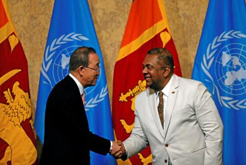 United Nations Secretary-General Ban Ki-moon (L) shakes hands with Sri Lanka's Minister of Foreign Affairs Mangala Samaraweera at the "Sustaining Peace - Achieving Sustainable Development Goals" forum during an official visit in Colombo, Sri Lanka, September 2, 2016. PHOTO BY REUTERS/Dinuka Liyanawatte