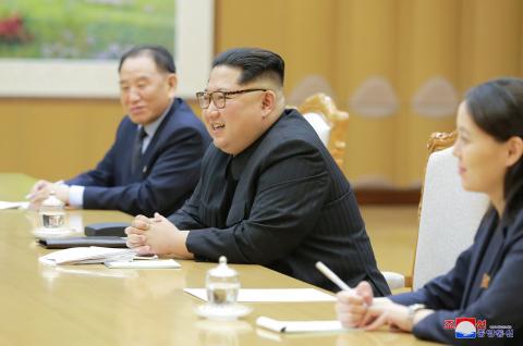 North Korean leader Kim Jong Un meets members of the special delegation of South Korea's President in this photo released by North Korea's Korean Central News Agency (KCNA) on March 6, 2018. PHOTO BY REUTERS/KCNA