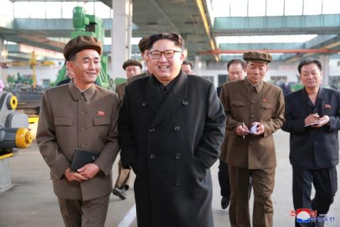 North Korean leader Kim Jong Un visits a factory in this undated picture provided by KCNA in Pyongyang on November 4, 2017. PHOTO BY REUTERS/KCNA