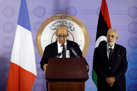 French Foreign Affairs Minister Jean-Yves Le Drian (L) speaks during a news conference at the headquarters of the prime minister's office in Tripoli, Libya, September 4, 2017. PHOTO BY REUTERS/Ismail Zitouny