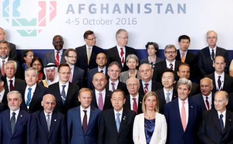 (Front Row L-R) Afghanistan's Chief Executive Abdullah Abdullah, President Ashraf Ghani, European Council President Donald Tusk, U.N. Secretary-General Ban Ki-moon, European Union foreign policy chief Federica Mogherini, U.S. Secretary of State John Kerry and Agha Khan in Brussels Conference on Afghanistan, in Belgium, October 5, 2016. PHOTO BY REUTERS/Francois Lenoir