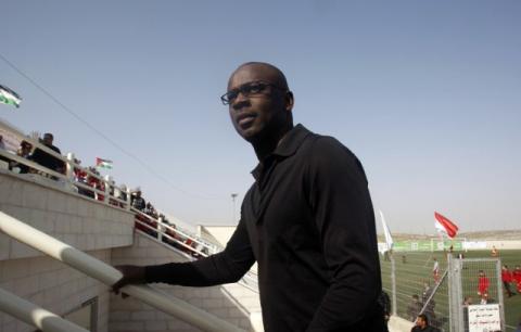 Former French soccer player Lilian Thuram attends an inauguration ceremony of a renovated football stadium in the West bank town of Al-Bireh near Ramallah, April 14, 2011. PHOTO BY REUTERS/Abed Omar Qusini