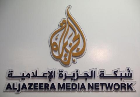 The logo of Al Jazeera Media Network. PHOTO BY REUTERS/Eric Gaillard