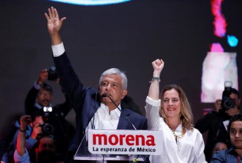 Presidential candidate Andres Manuel Lopez Obrador speaks next to his wife Beatriz Gutierrez Muller after winning the presidential election, in Mexico City, Mexico, July 2, 2018. PHOTO BY REUTERS/Alexandre Meneghini