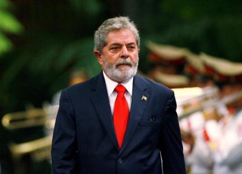 Brazil's former President Luiz Inacio Lula da Silva reviews the honor guard during a reception ceremony at Havana's Revolution Palace, January 15, 2008. PHOTO BY REUTERS/Claudia Daut