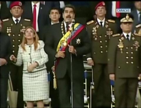 Venezuelan President Nicolas Maduro reacts during an event which was interrupted, in this still frame taken from video, August 4, 2018, Caracas, Venezuela. PHOTO BY REUTERS/VENEZUELAN GOVERNMENT TV