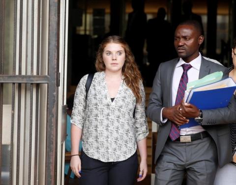 U.S. citizen Martha O'Donovan (L) accused of attempting to subvert former President Robert Mugabe's government leaves the courts in Harare, Zimbabwe, December 8, 2017. PHOTO BY REUTERS/Philimon Bulawayo